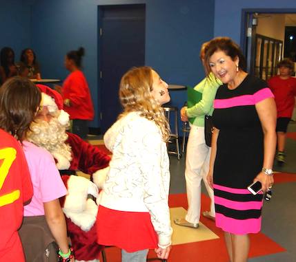 Forough Hosseini, VP of ICI Homes in Daytona Beach, FL does a lot of charitry work for benefit of kids / adline Surfer®