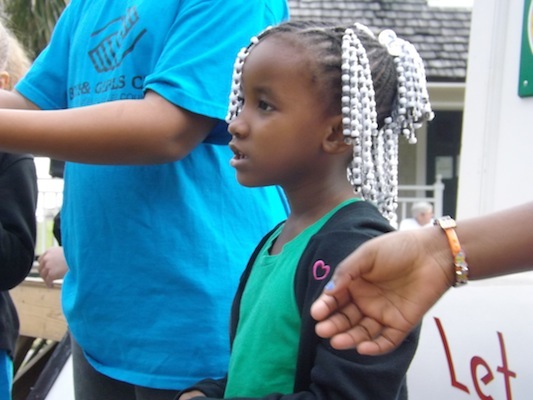 Small child at MLK holiday ceremony in New Smyrna Beach / Headline Surfer®