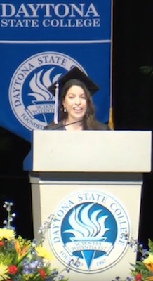 Sofia Rivas, Daytona State Student Gov't Assn President, addresses fellow grads / Headline Surfer