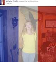 Michelle Tyluki of Oak Hill, Florida shows support for Paris / Headline Surfer®