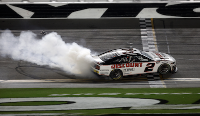 Austin Cindric does a burnout after winning the Daytona 500 / Headline Surfer