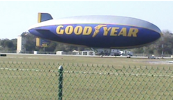 Goodyear blimp at Daytona International Speedway / Headline Surfer