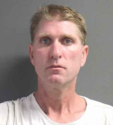 Mark Ruth bookingh mug / Headline Surfer