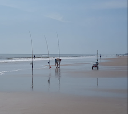 Fishing on the shoreline of Daytona Beach, Florida / Headline Surfer